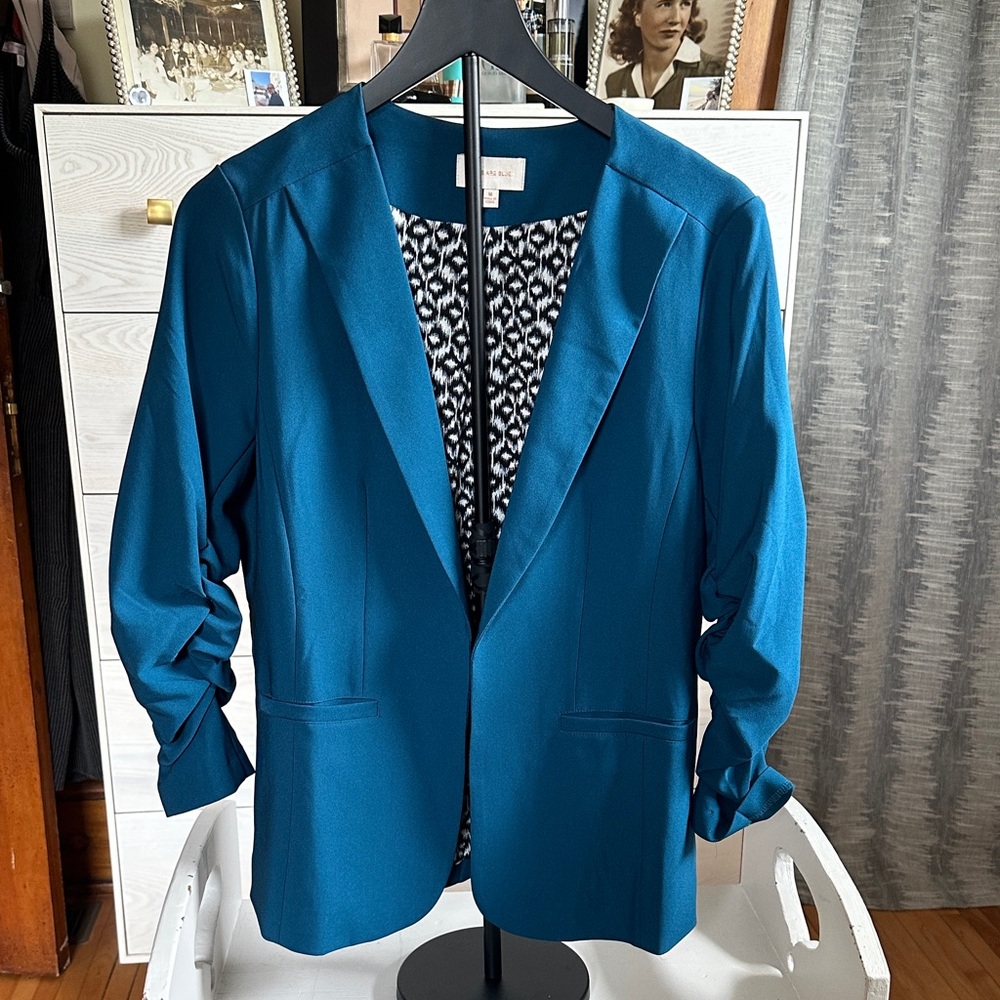 Skies Are Blue Teal Jacket with Black and White Lining
